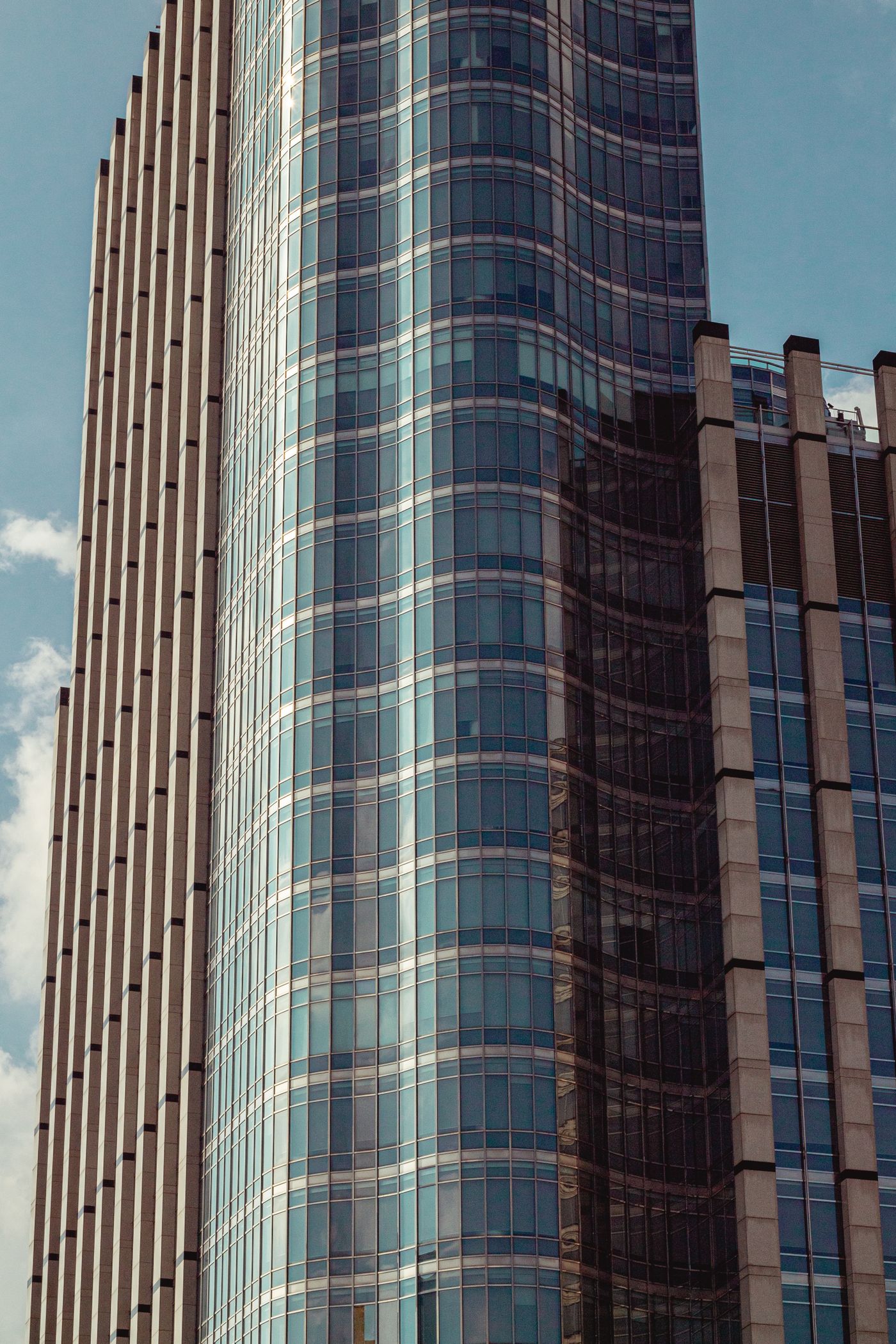 A modern commercial office building with a glass facade